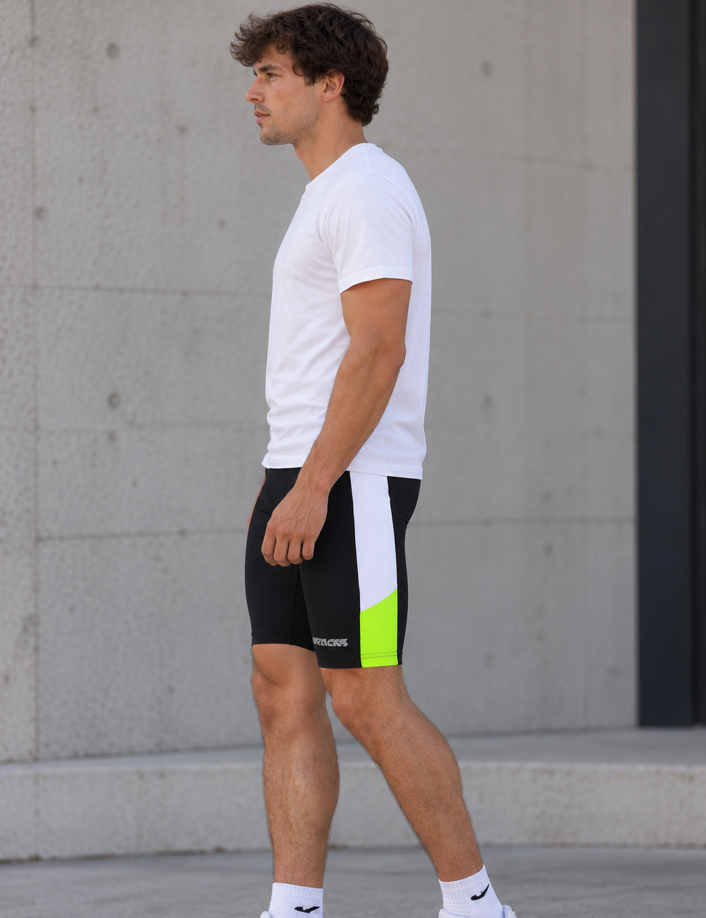Pantalones de carrera para hombres neón negro corto
